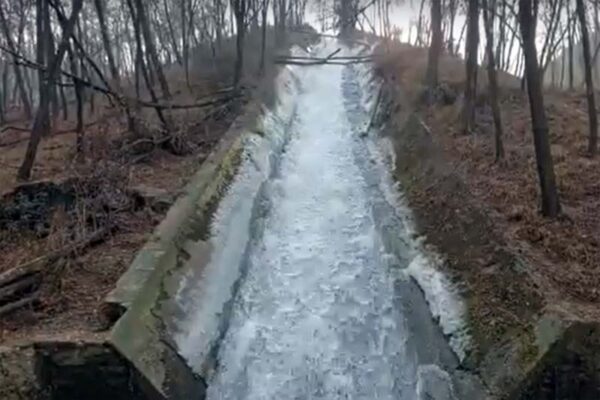 Frozen Power Canal Draws Tourists in Ganderbal