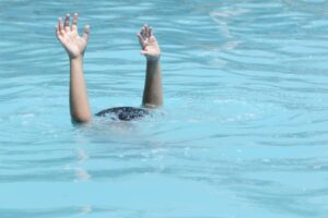 hands-drowning-boy-15131124
