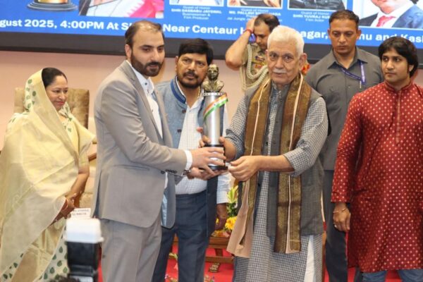 DC Pulwama Dr. Basharat Qayoom IAS Conferred with Bharat Ratna Dr. B.R. Ambedkar Award 2025 at SKICC Srinagar